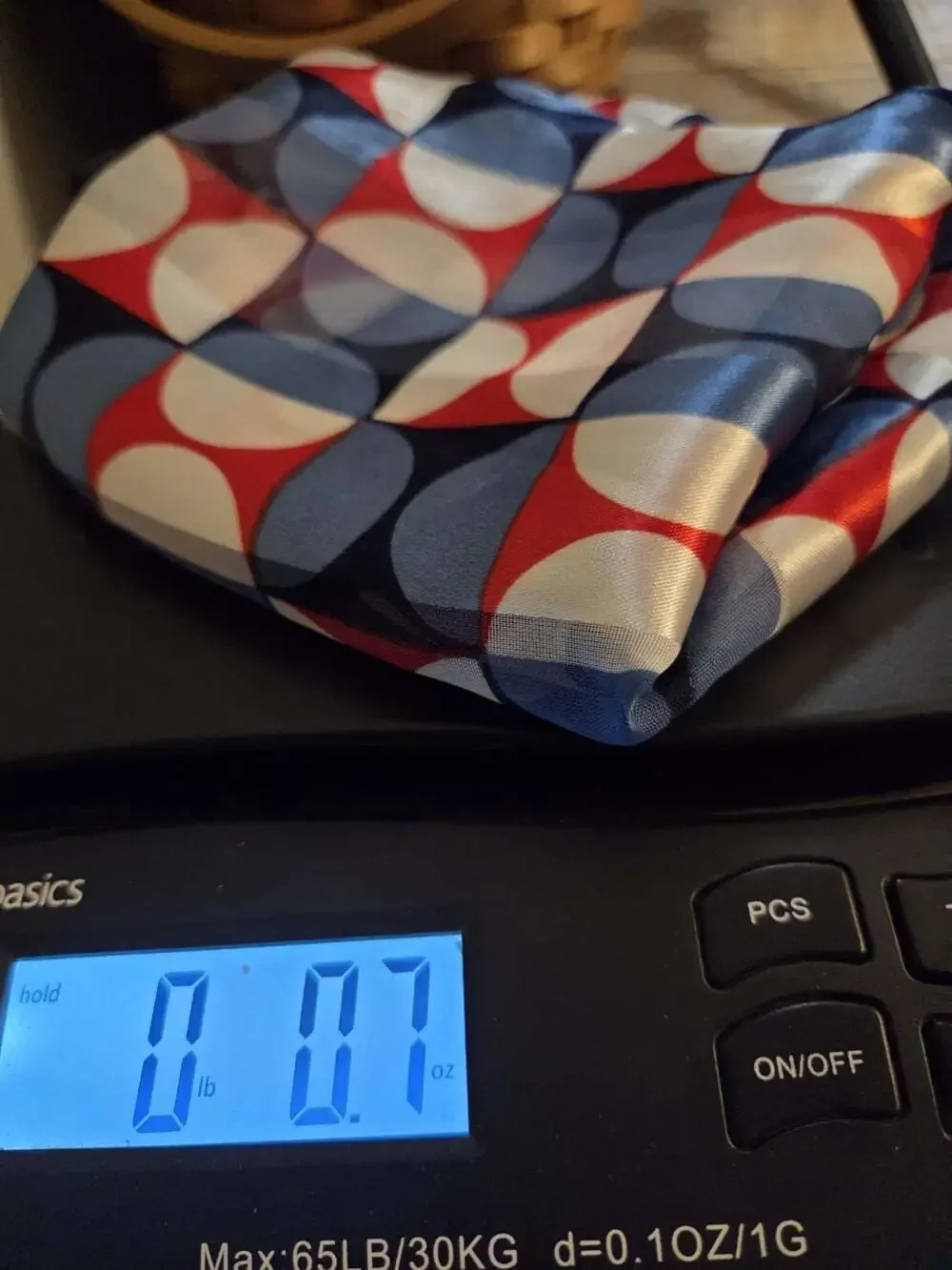 vintage geometric silk scarf features a retro mid-century modern pattern